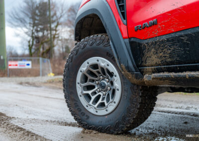 Close-up of the silver beadlock wheels on a 2025 Ram 1500 RHO