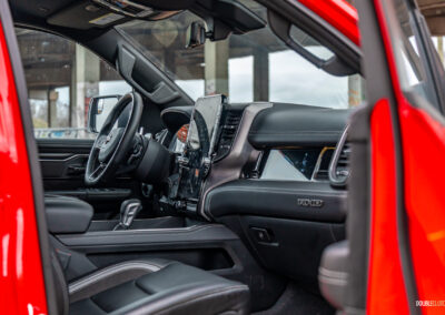 Interior view showing the dashboard design and interior layout in a 2025 Ram 1500 RHO