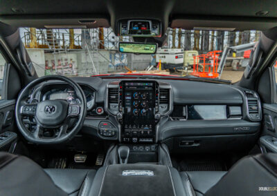 Interior view showing the dashboard design and interior layout in a 2025 Ram 1500 RHO