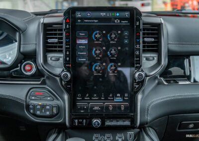 Close-up showing the portrait-oriented touchscreen inside a 2025 Ram 1500 RHO