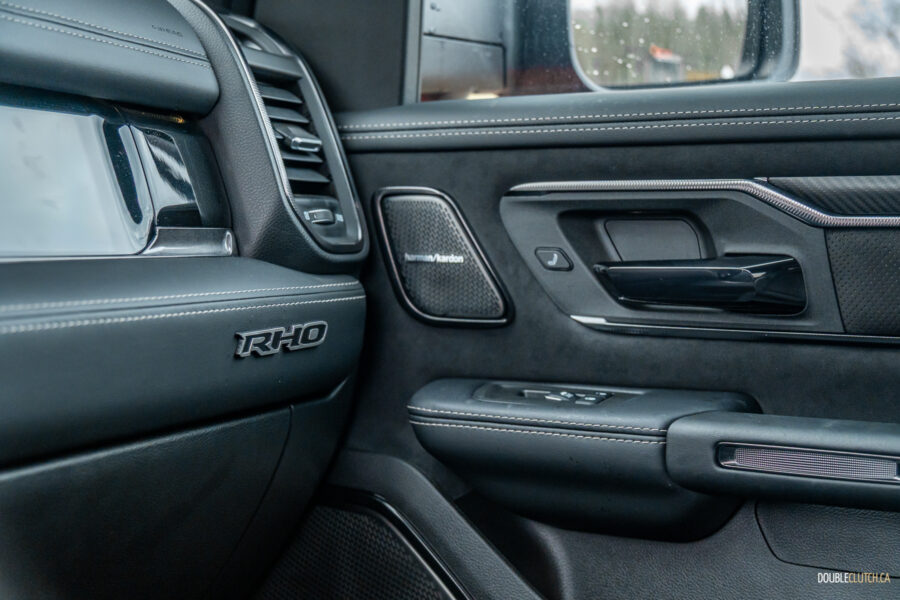 Interior view showing the passenger-side door panel design in a 2025 Ram 1500 RHO