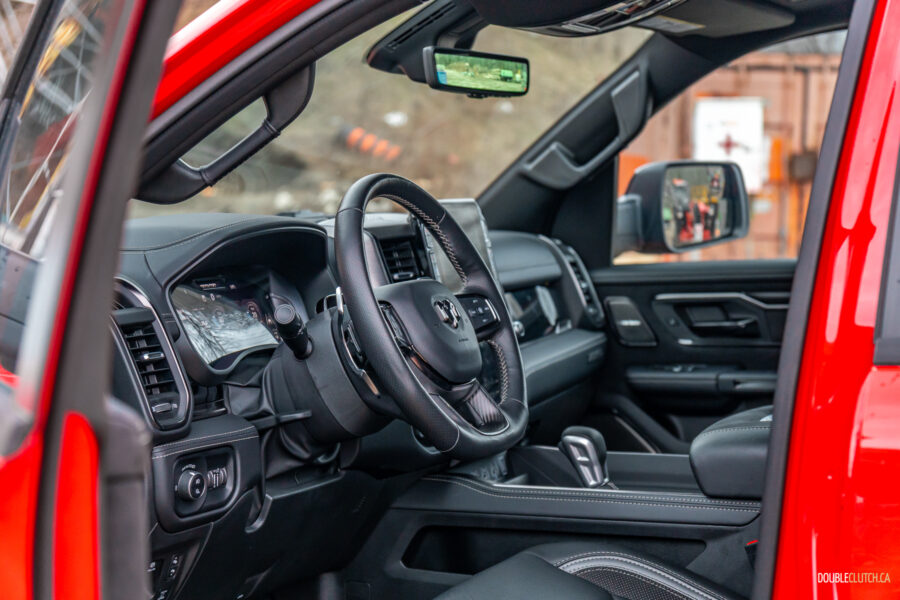 Interior view showing the dashboard design and interior layout in a 2025 Ram 1500 RHO