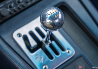 Close-up of the gated shift mechanism in a 1996 Ferrari 550 Maranello