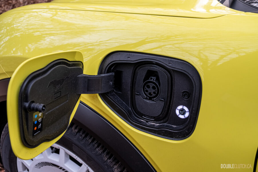 Close-up showing the charge port in a 2025 Ford Mustang Mach-E Rally