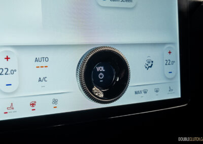 Close-up showing the volume knob integrated into the infotainment display in a 2025 Ford Mustang Mach-E Rally
