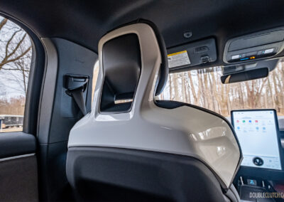 Interior view showing the gloss white trim on the seats of a 2025 Ford Mustang Mach-E Rally