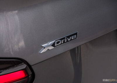 2025 BMW M240i xDrive trunk badge close-up