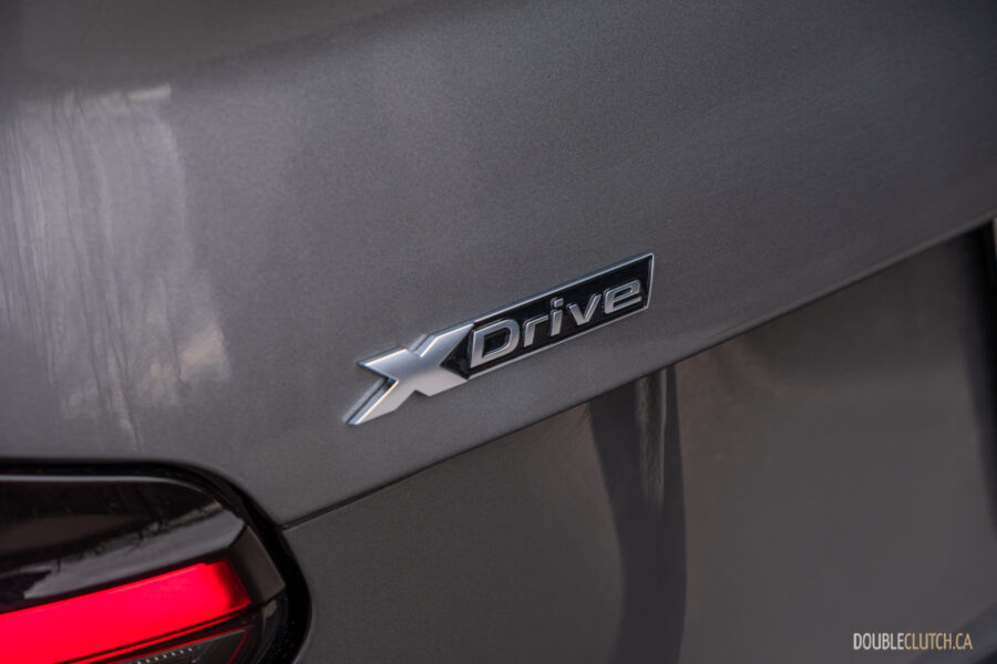 2025 BMW M240i xDrive trunk badge close-up