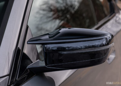 2025 BMW M240i xDrive side-view mirror close-up