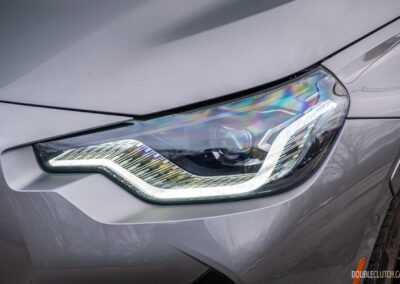 2025 BMW M240i xDrive headlight close-up