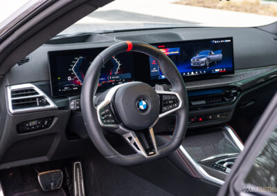 2025 BMW M240i xDrive interior driver's side cockpit view