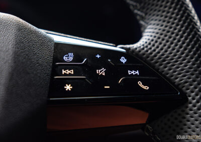 2025 Audi SQ5 steering wheel audio control close-up