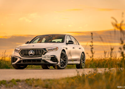 2025 Mercedes-AMG E 53 front quarter view at sunset