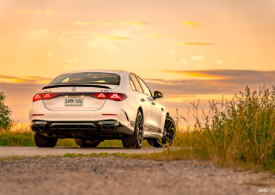 2025 Mercedes-AMG E 53 rear quarter view at sunset