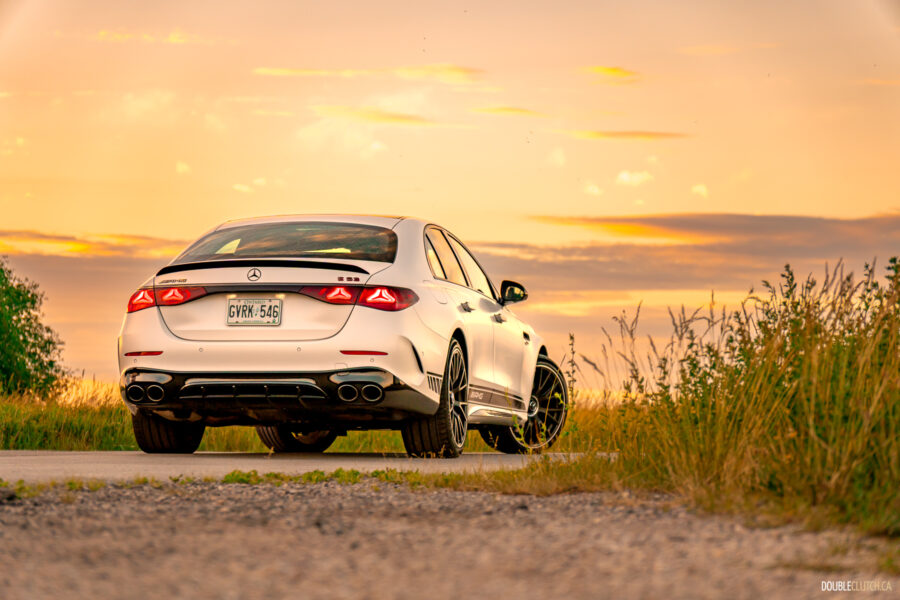 2025 Mercedes-AMG E 53 rear quarter view at sunset