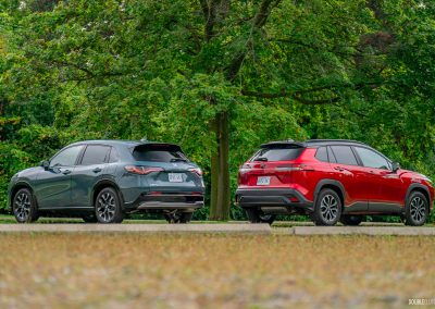 Rear of 2026 Honda HR-V and 2026 Toyota Corolla Cross together