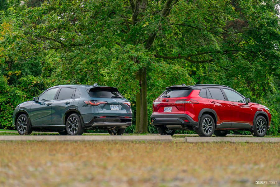Rear of 2026 Honda HR-V and 2026 Toyota Corolla Cross together