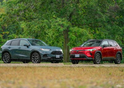 Rear of 2026 Honda HR-V and 2026 Toyota Corolla Cross together
