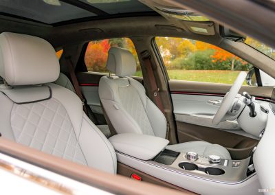 2026 Genesis Electrified GV70 interior in white and brown