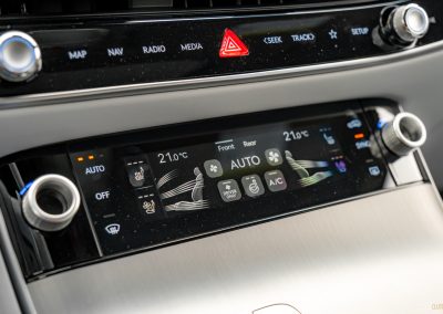 2026 Genesis Electrified GV70 interior in white and brown