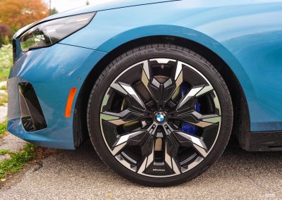 2025 BMW 540i Legacy Edition in Maldives Blue wheel close up