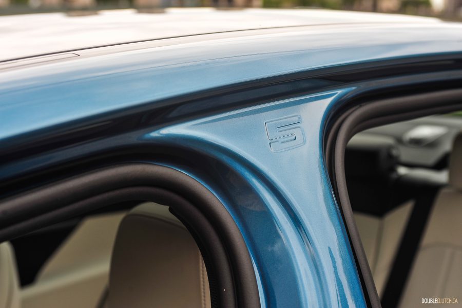 2025 BMW 540i Legacy Edition in Maldives Blue close up B pillar