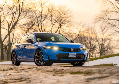 2026 Honda Civic Hatchback Hybrid in Boost Blue