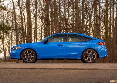2026 Honda Civic Hatchback Hybrid in Boost Blue