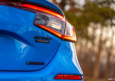 2026 Honda Civic Hatchback Hybrid in Boost Blue