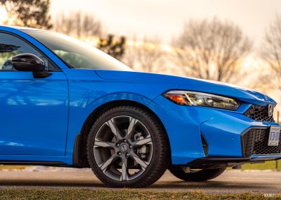 2026 Honda Civic Hatchback Hybrid in Boost Blue