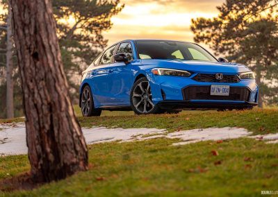 2026 Honda Civic Hatchback Hybrid in Boost Blue